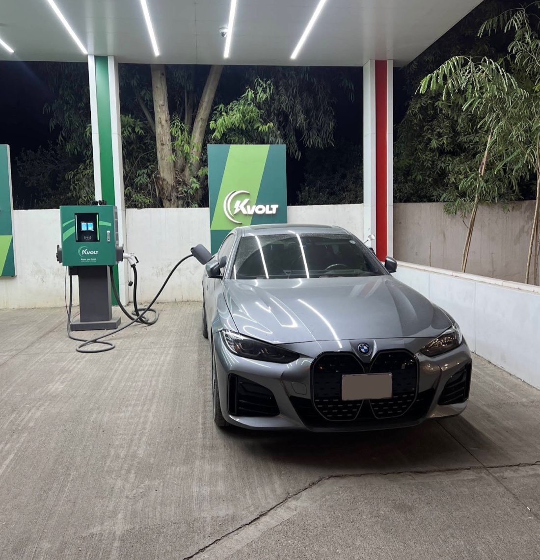 KVolt station with an EV charging under the branded canopy